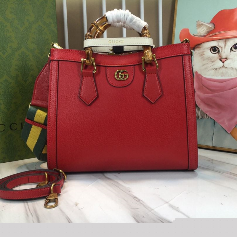 G*u*i top handle bags